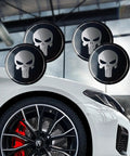 Legit Badass Skull Style Metal Wheel Center Hub Caps For Cars And Trucks, Scratch Resistant Self Adhesive Rim Covers, Heavy Duty Universal Black Upgrade For Your Ride displayed on a white car with detailed rim.