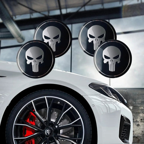 Legit Badass Skull Style Metal Wheel Center Hub Caps For Cars And Trucks, Scratch Resistant Self Adhesive Rim Covers, Heavy Duty Universal Black Upgrade For Your Ride displayed on a white car with detailed rim.