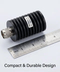 Pro Grade 50 Watt 50 Ohm UHF PL259 Dummy Load For Ham Radio And Antenna Testing beside ruler for size reference
