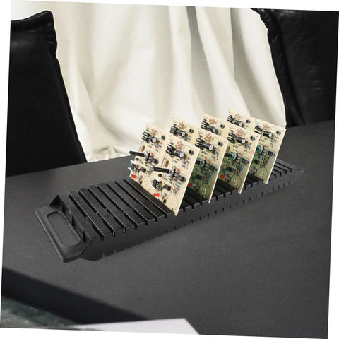 Pro Grade 25 Slot Anti Static Circuit Board Rack And Drying Tray Set Of 3 holding circuit boards on a table