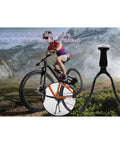 Double Leg Kickstand For Mountain And Road Bikes, Heavy Duty Bike Stand Mount Parking Rack next to mountain bike and rider