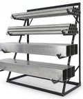 Heavy Duty 4 Tier Lumber Storage Rack With Adjustable Steel Frame And Tough As Nails Build holding PVC pipes and boards.