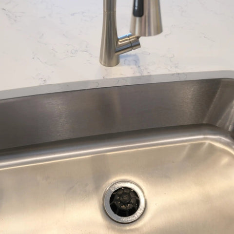 Disposal Genie Garbage Disposal Strainer And Splash Guard With Silicone Food Scraper For Kitchen Sink Keeps Junk Out Of The Drain And Prevents Clogs Black Finish Now installed in a stainless steel sink