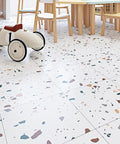 Kids playroom with Terrazzo Peel And Stick Floor Tiles 12x12 Inch 32 Pack Waterproof Vinyl Sheet Flooring For Bathroom And Kitchen visible.