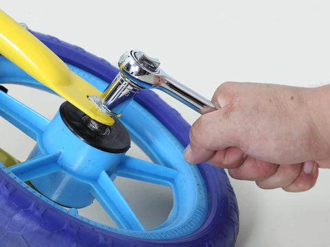 Using ratchet on bike wheel from 149-Piece Home And Auto Tool Kit With Hammer, Ratchets, Sockets, Pliers, Hex Keys And Durable Case