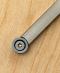 Woodturning tool handle with interchangeable head, charcoal translucent finish, metal collar and screw (close-up view)