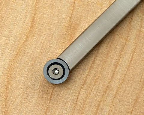 Woodturning tool handle with interchangeable head, charcoal translucent finish, metal collar and screw (close-up view)