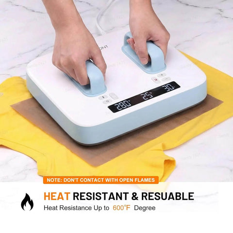 Nonstick Teflon Sheets For Heat Press 12 Inch By 8 Foot PTFE Roll in use for vinyl HTV iron transfers on yellow fabric.