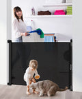 Adjustable Mesh Baby Gate 0 To 60 Inches Wide With Safety Lock Roll Up To Save Space Portable Folding Mesh Dog Gate for stairs in use