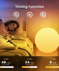 Woman sleeping next to Huge 16 Inch RGB Night Light Ball With Remote Control Color Changing Waterproof Glow with timing function.