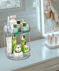 360 Degree Rotating Makeup Organizer With 2 Tier Lazy Susan Vanity Countertop Organizer in Classic Grey on a white vanity.