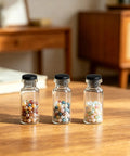 Five Zero Pcs Silicone Rubber Plugs For Holes 1/8 Inch To 3/8 Inch Bumpers Seal Dust And Gaps On Wood Or Metal Make Surfaces Look Nice Tight Fit Stuff, three clear bottles on table