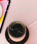 Keep Your Daily Grind From Turning Ice Cold With This Smart Desk Mug Warmer Featuring Auto Power Off Touch Sensor Energy Saving Silent Setup And Universal Fit For Flat Bottom Cups with steaming coffee.