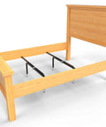 Heavy Duty Bed Slats Center Support System with adjustable steel legs under a wooden bed frame for queen king California king beds.