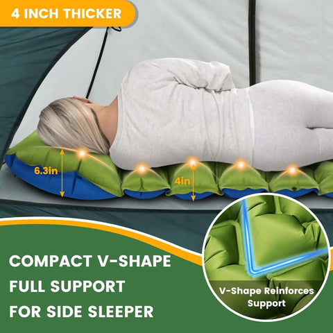 Person lying on side on ultralight inflatable camping pad with pillow and built-in foot pump, 4 inch thick V shape support.