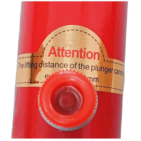 Close-up of the label on the Beastly 10 Ton Hydraulic Porta Power Lift Kit with red body and lifting instructions.