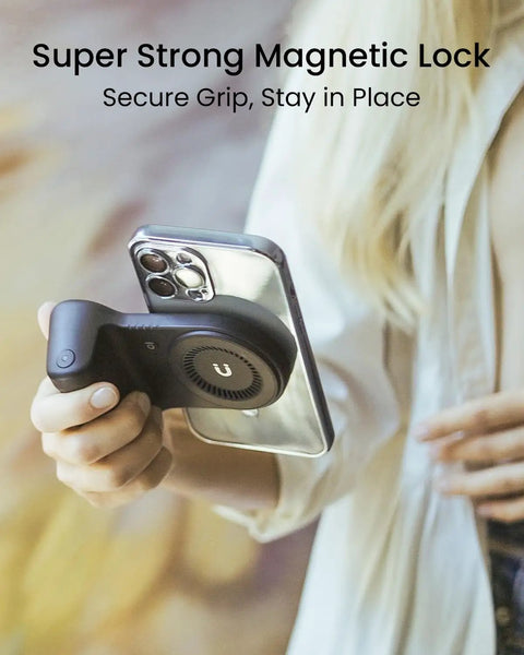 Magnetic Phone Stand Camera Grip With Wireless Charging and Bluetooth Shutter for iPhone held in hand for vlogging.