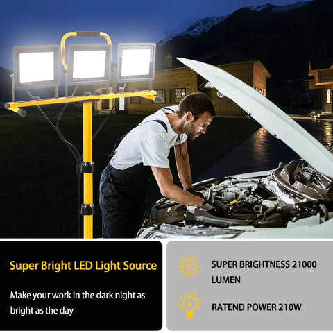 Beastly Bright 22000 Lumen LED Work Light With Adjustable Foldable Tripod Stand lighting up a car engine repair at night outdoors