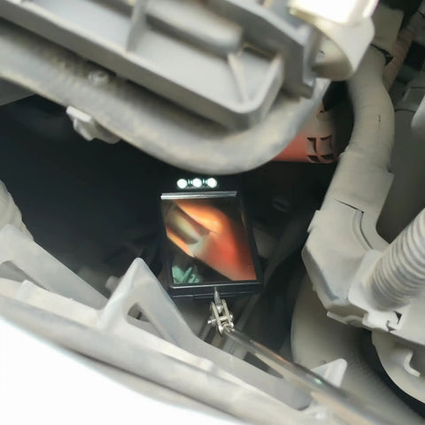 Telescopic LED Inspection Mirror With 360 Degree Rotation For Cars And Machinery, flexible handle, shown in engine bay