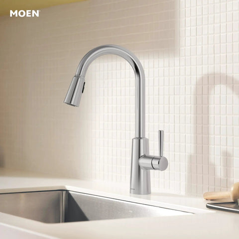Pulldown Kitchen Faucet With Power Clean Spray And Reflex Docking System For Easy Docking, Smooth Operation, And Powerful Cleaning, One Handle Modern Sink Faucet 7402C installed on a white tiled backsplash.