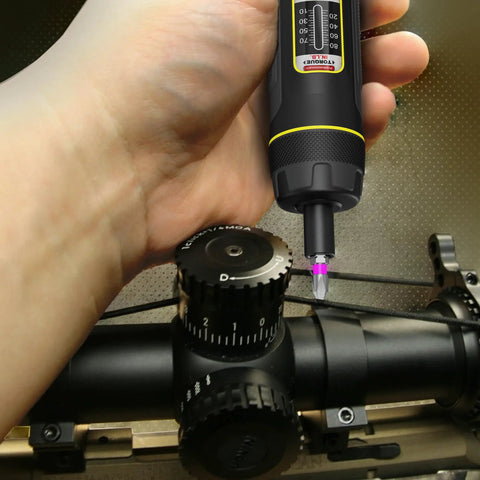 Using Torque Screwdriver Set With 31-Piece S2 Steel Bits on scope mount, 10-80 Inch-Pounds Torque Range visible