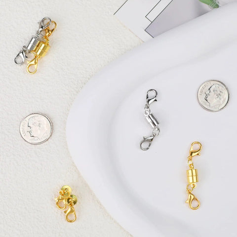 Magnetic Necklace Clasp Set With Double Lobster Clasps, 14K Gold And Silver Extenders for Women's jewelry, displayed with coins