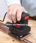 Hand using palm sander with Twin Ultra Fine 42 Piece Wet Dry Sandpaper Set Featuring 240 To 10000 Grit Assortment 4.5 To 5.5 Inch Sheets