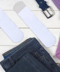 Two Pack Straight Sock Jigs Made From Aluminum For Heat Press Sublimation Printing visible beside denim and clothing
