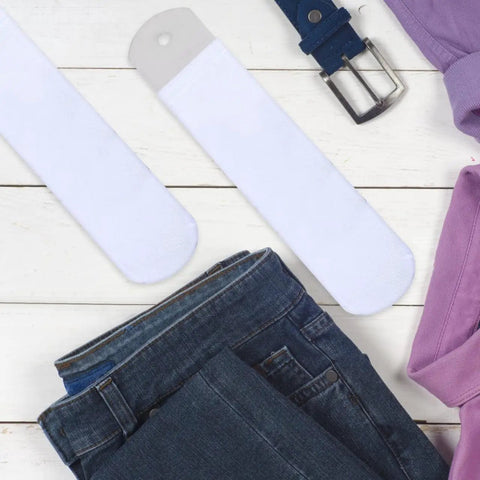 Two Pack Straight Sock Jigs Made From Aluminum For Heat Press Sublimation Printing visible beside denim and clothing
