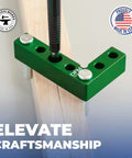 Green carpentry tool demonstrating centering function with a durable metal build, showcasing 'Made in USA' badge.