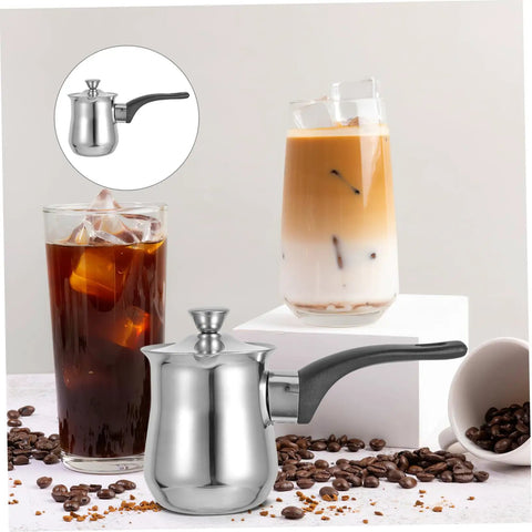 Turkish Teapot 180ml Milk Frothing Pot Stainless Steel Induction Coffee Pot next to iced coffee and cappuccino