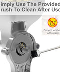 Heavy Duty All Metal Grain Mill Attachment for Stand Mixer being cleaned with a brush