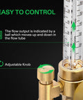 Close-up of brass gas regulator with clear flow meter tube and adjustable knurled knob.