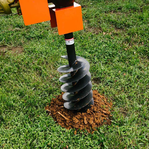 60 HP Three-Point Post Hole Digger With Nine Inch Auger Attachment for Cat 1 Tractors drilling into grass soil