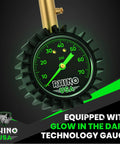 Front view of Rhino USA heavy duty tire pressure gauge with large glow dial (0-75 psi), brass nozzle, braided hose.