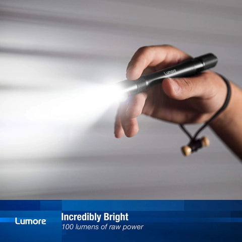 Person holding Pocket Light 4 Pack With 100 Lumen Handheld Flashlights, 2 Hour Runtime, Battery Powered, Waterproof And Durable