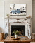 Rustic Countryside Barn Canvas Wall Art Featuring Blue Rusty Old Pickup Truck, White Flower Meadow, Windmill and Barn Backdrop For Farmhouse Decor, Vintage Country Vibe Print, 24x16 Inches in a living room
