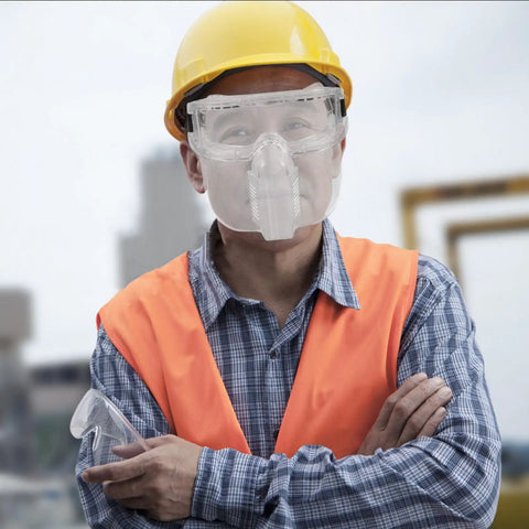 Heavy Duty Adjustable Welding Safety Goggles With Smooth Antifog Clear Lens For Rock Solid Industrial Eye Protection and Crisp Daylong Visibility On Any Daily Grind worn by a worker in safety gear.
