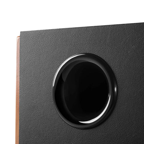 Close-up of S1000MKII Audiophile Active Bookshelf Speakers 2.0 with visible black textured surface and round port