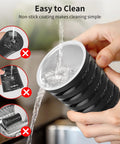 Person cleaning 4 In 1 Electric Milk Frother For Hot And Cold Foam, Temperature Control And Auto Shut Off, Perfect For Lattes, Cappuccinos, Macchiatos And More, Sleek Stainless Milk Warmer For Barista Grade Froth At Home under running water