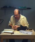 Solid Aluminum Tool Box Featuring A Slick Padded Interior And Extra Sturdy Reinforced Handle on a table with tools.