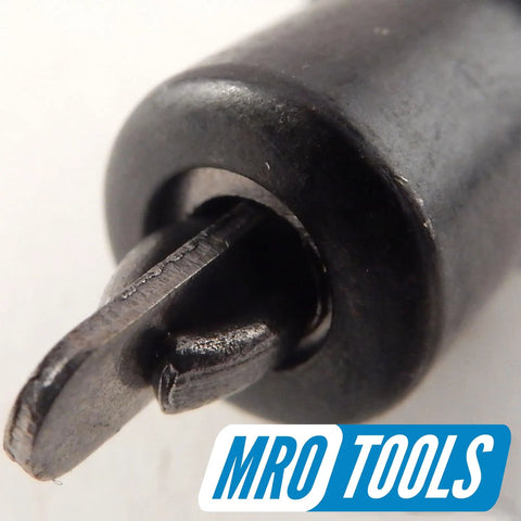 Close-up of a Cleco fastener tip from Set of 50 Extra Short Five Thirty Second Inch Fasteners and Pliers With Carry Bag for Quick Sheet Metal Setup USA Made Black Finish Drill Size Twenty Ideal for Auto Body Panel Work.