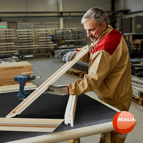 Man working with wood on Heavy Duty 15 X 36 Inch Work Bench Mat With Scratch-Resistant 0.06 Inch PVC Protects Your Workbench, Table, And Tool Station From Painting, Woodworking, Crafting, And Building Messes Black Made In USA.