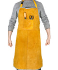 Heavy Duty Split Cowhide Leather Welding Apron With Adjustable Neck Strap And Flame Resistant Spatter Shield For Blacksmiths And Metal Workers, yellow with tools in pocket.