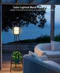2 Pack Solar Floor Lamps With Plant Stands For Outdoors, Waterproof Solar Powered Garden Lights on patio at dusk