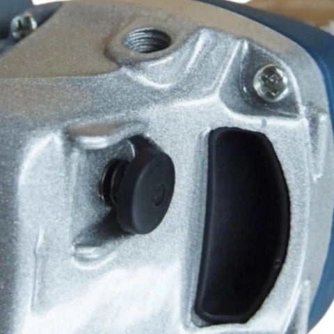 Close-up of Premium Electric Angle Grinder Replacement Parts with Comfortable Grip, showcasing metal housing and safety switch.