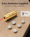 Top Tier.45 Colt And 12 Gauge Shotgun Laser Bore Sighter Cartridge showing laser output with extra batteries on wooden surface.