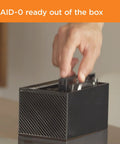 User inserting drives into the Ridiculous Capacity 20TB External Hard Drive Desktop RAID Rig for media storage.
