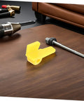 Pro Grade Tire Changer Head Protector Guards 2 Pack Yellow Scratch Resistant Jaw Covers on a workbench