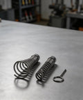 Heavy Duty Six Piece Drain Auger Kit Mounts To Standard Electric Drill For Quick Bathroom Sink Clog Removal showing two spiral augers and a key.